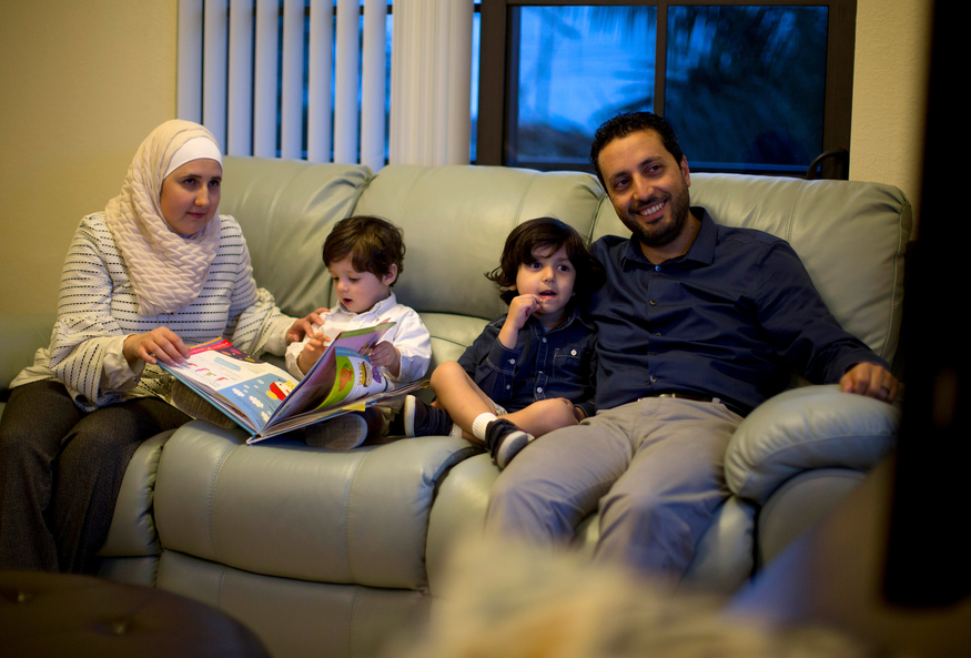 Mohammad at home with his family